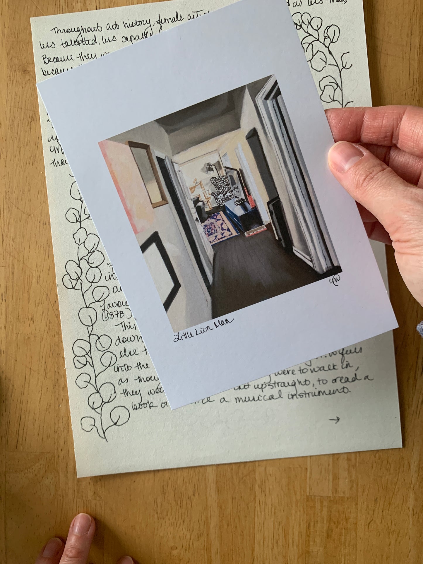 Mini pet portrait held on top of a snail mail letter. 
